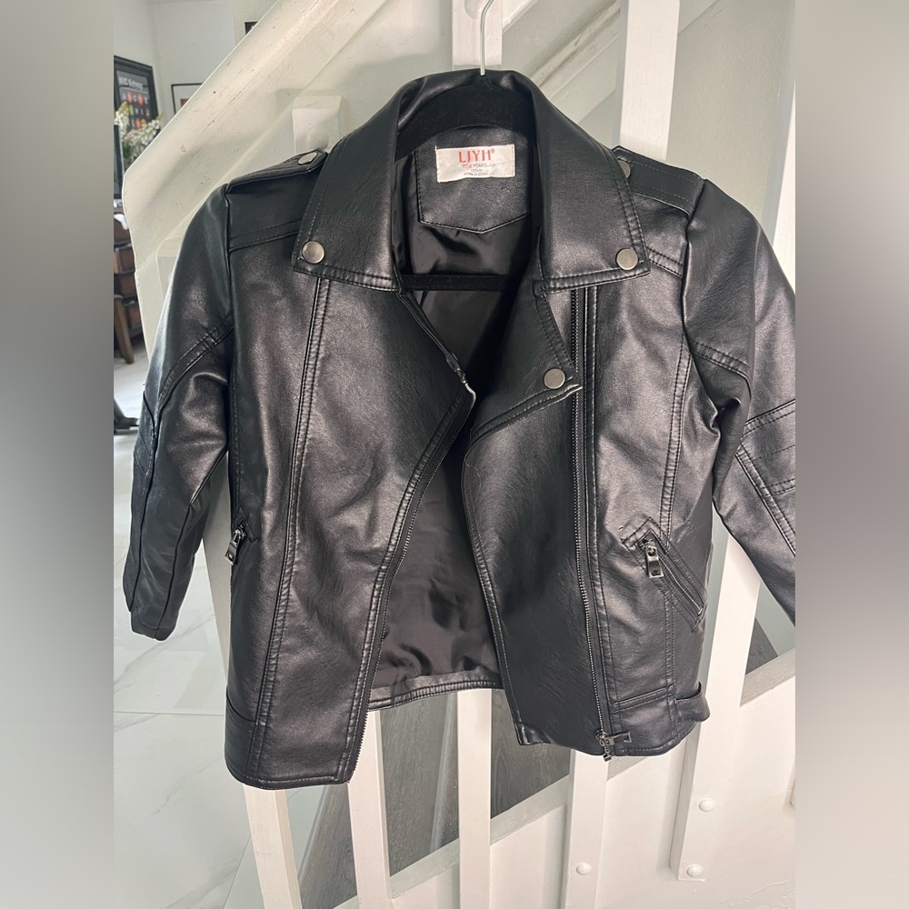 Kids LJHY faux leather jacket. Size T 7-8 years.